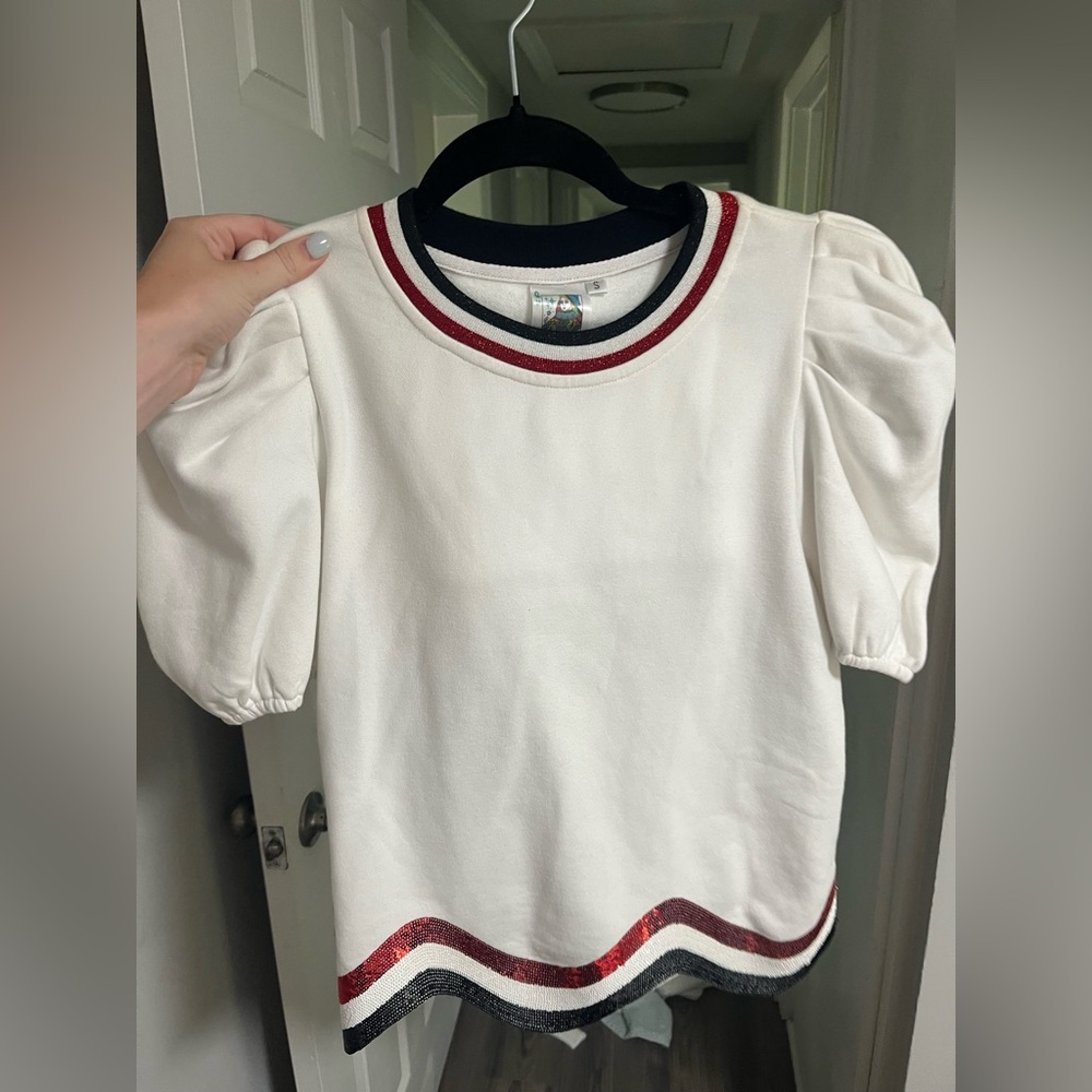 White Shirt with Red and Black Accents
